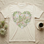 T-shirt with a heart-shaped floral design featuring a praying mantis and crystals.
