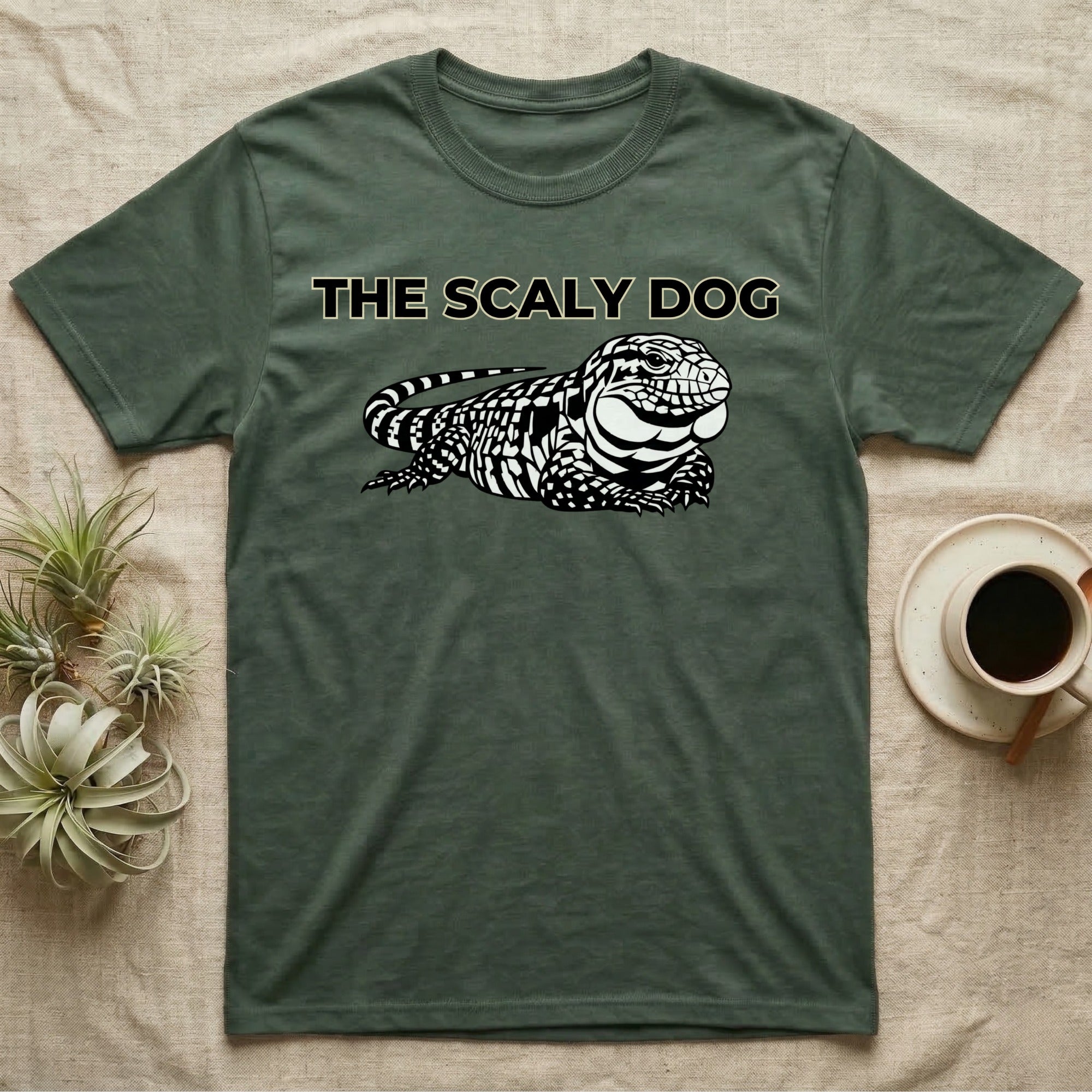 Dark green t-shirt with "The Scaly Dog" text and lizard graphic.