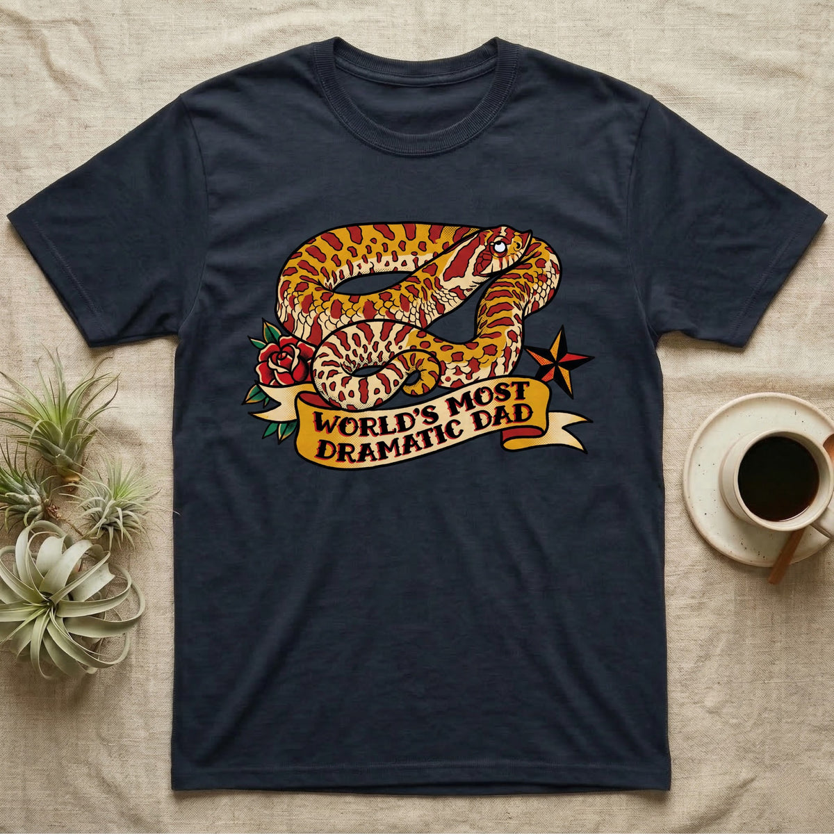 Dramatic Dad Hognose T-Shirt in Navy — Tattoo-flash illustration of a hognose snake mid-dramatic-flop with a banner reading World's Most Dramatic Dad.