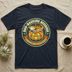 Bearded Dragon Boo-Basking T-Shirt in Navy — Retro badge of a caped bearded dragon on a green-glowing pumpkin, "Boo-Basking Division, Spooky But Still Cozy."