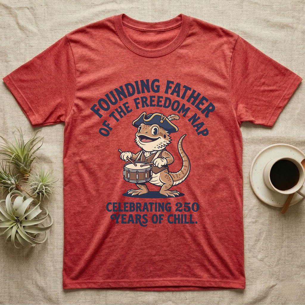 Bearded Dragon Freedom Nap T-Shirt in Heather Red — Cartoon bearded dragon as a drummer boy under arched text Founding Father of the Freedom Nap, 250 Years of Chill.