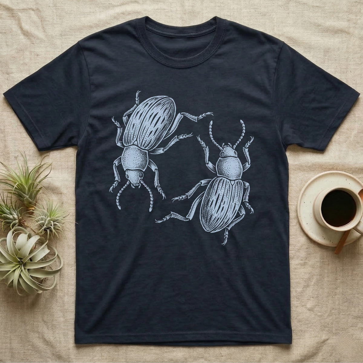 Death-Feigning Beetle Roundel T-Shirt in Navy — Two blue death-feigning beetles in pale blue brush line art, rotated 180 degrees into a circle closed by their own bodies.