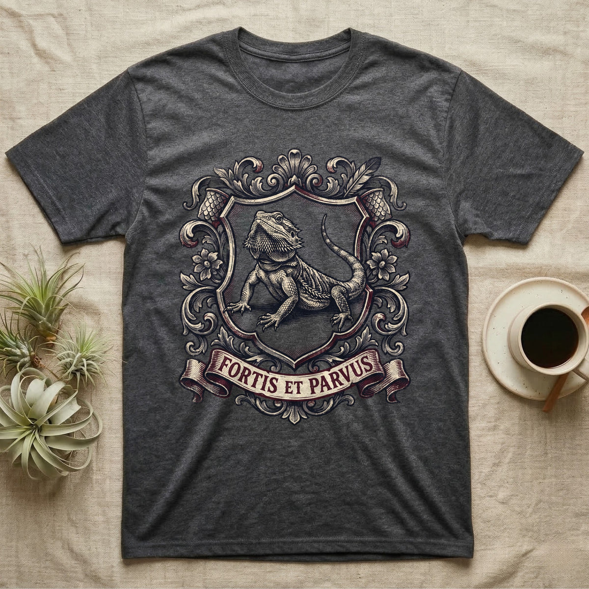 Bearded Dragon Heraldry T-Shirt in Dark Heather — Engraved heraldic crest of a bearded dragon posed as a regal dragon on a shield with a ribbon banner.