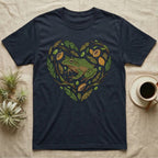 Dark t-shirt with a green frog and leaves forming a heart shape.