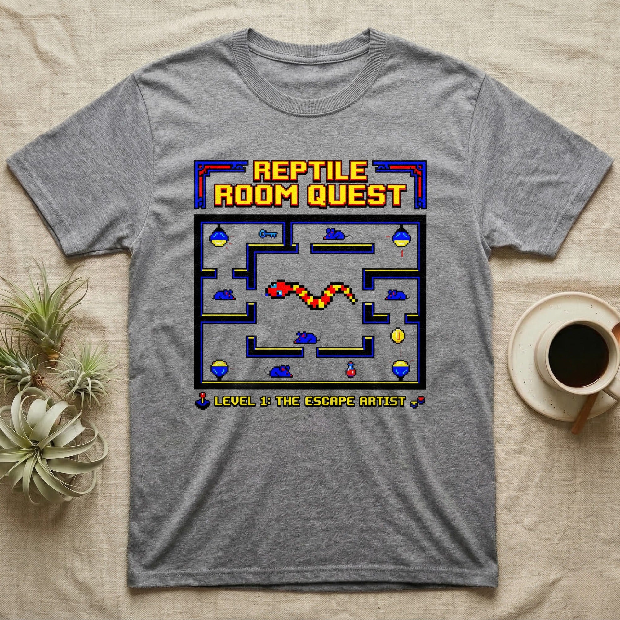 Gray t-shirt with "Reptile Room Quest" and pixelated snake game.
