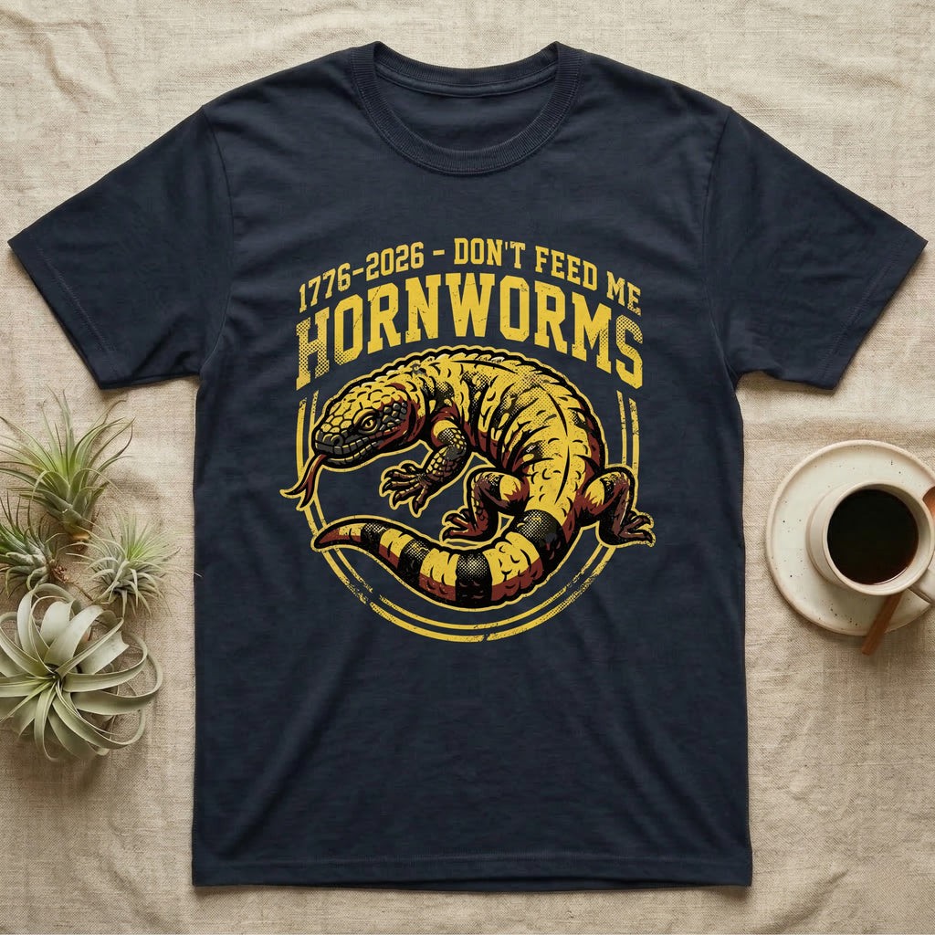 Gila Monster Hornworms Tee in Navy — Bold gold and maroon woodcut tee of a Gila monster with banded tail, large text reading Don't Feed Me Hornworms, on black.