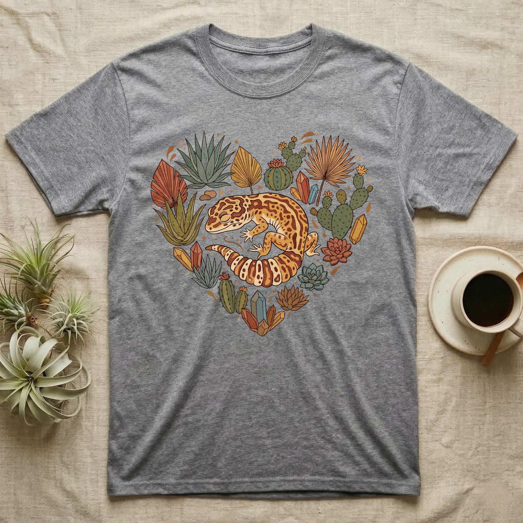 Grey t-shirt with a heart-shaped design of a leopard gecko and desert plants.