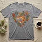 Grey t-shirt with a heart-shaped design of a leopard gecko and desert plants.