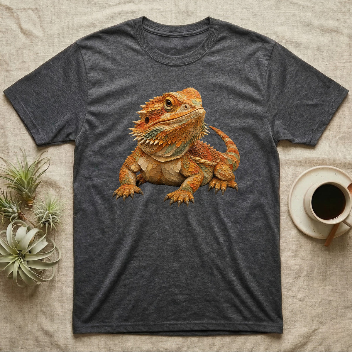 Dark grey t-shirt featuring a colorful bearded dragon graphic.