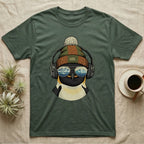 Penguin wearing headphones and sunglasses with mountain reflection.