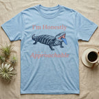 Blue-Tongued Skink Hiss T-Shirt in Light Blue — Navy engraving of a hissing blue-tongued skink with its bright blue tongue out between the words I'm Honestly and very Approachable