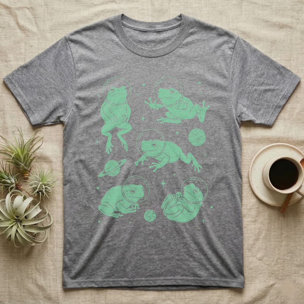 Whites Tree Frog Cosmic T-Shirt in Sport Grey — Vintage screen-print illustration of White's tree frogs in astronaut helmets floating in space, cosmic jade green monochromatic on dark background.