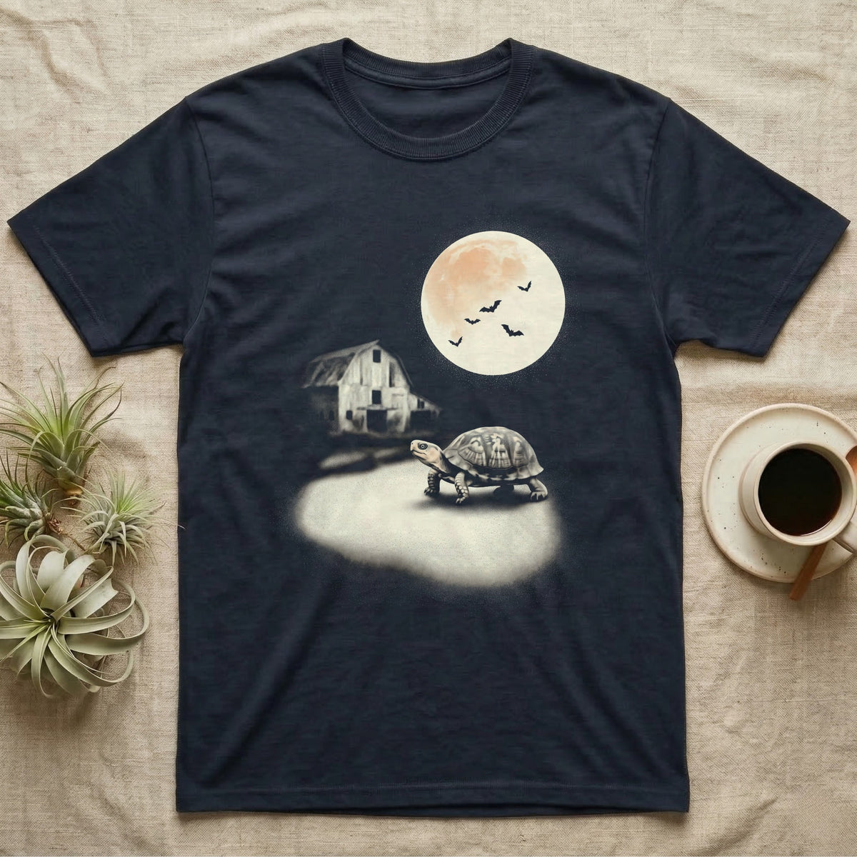 Box Turtle Moonlight T-Shirt in Navy — An eastern box turtle mid-step across a moonlit yard, a derelict barn behind it and a large cream moon high right.