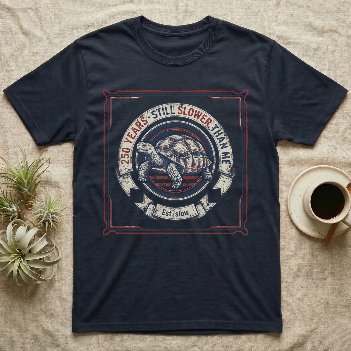 Slower Than Me Tortoise T-Shirt in Navy — Vintage-Americana roundel illustration of a tortoise with a banner reading "250 Years, Still Slower Than Me."