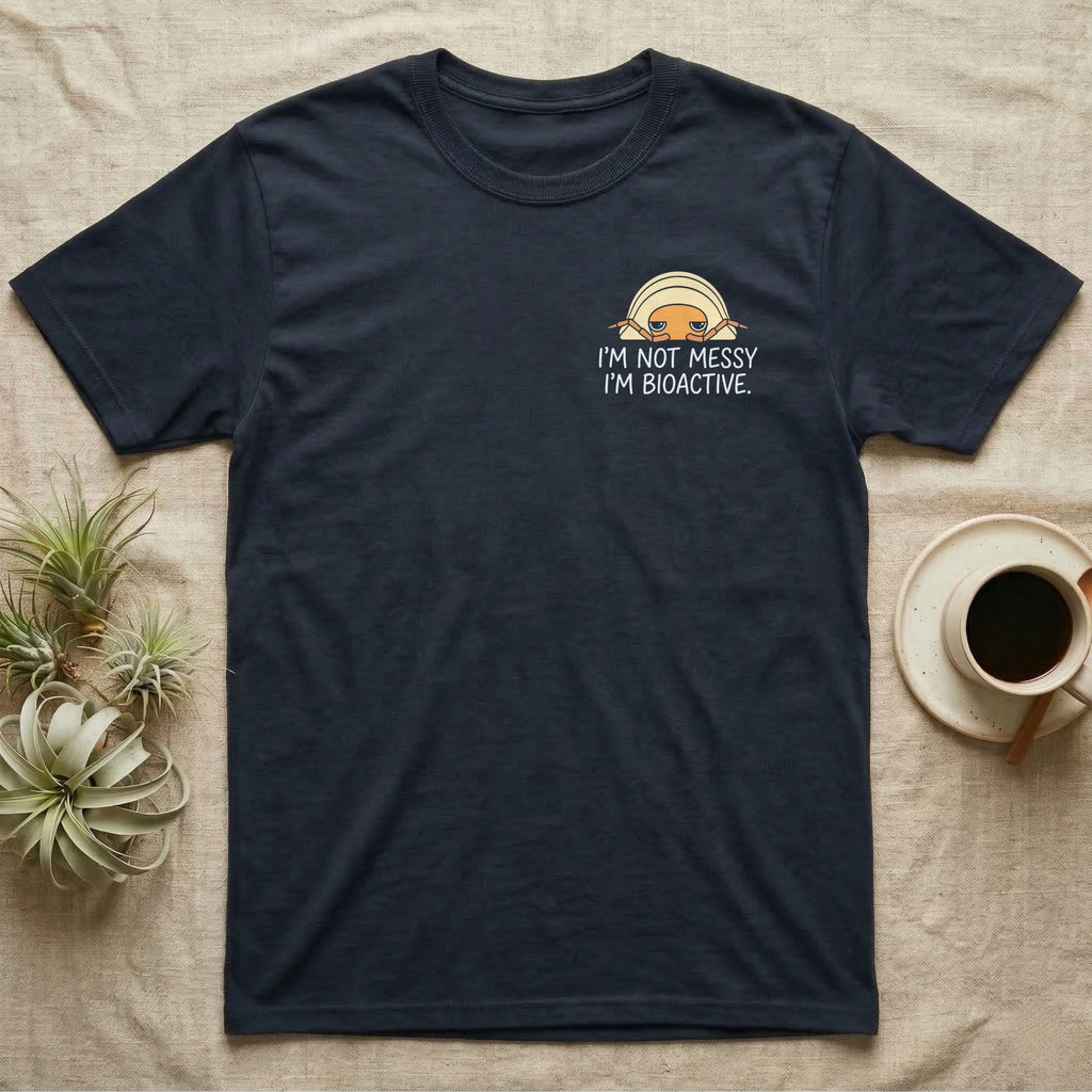 Bioactive Rubber Ducky T-Shirt in Navy — Creamy-yellow rubber ducky isopod with an orange face peeking over white marker capitals reading I'M NOT MESSY I'M BIOACTIVE.