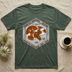 Green t-shirt with hexagonal logo featuring snake pattern and text "Genetic Wonder - Rerail".