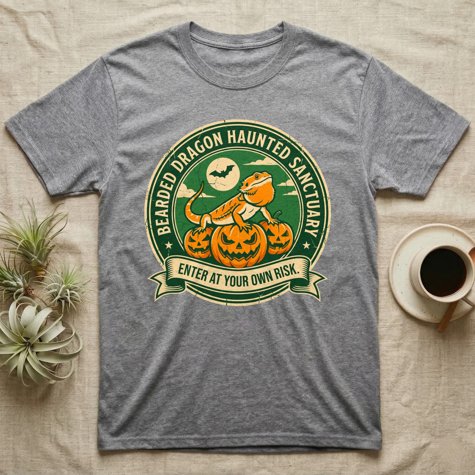 Bearded Dragon Haunted Sanctuary T-Shirt in Sport Grey — Vintage badge of a bearded dragon on glowing pumpkins under a moon, "Bearded Dragon Haunted Sanctuary."