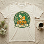 Bearded Dragon Haunted Sanctuary T-Shirt in Natural — Vintage badge of a bearded dragon on glowing pumpkins under a moon, "Bearded Dragon Haunted Sanctuary."
