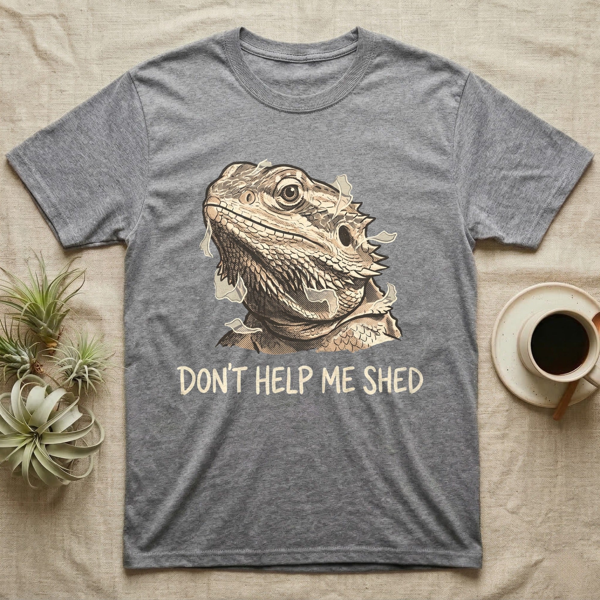 Don't Help Me Shed T-Shirt in Sport Grey — Retro-illustration of a bearded dragon mid-shed with a deadpan side-eye and a marker caption reading Don't Help Me Shed.