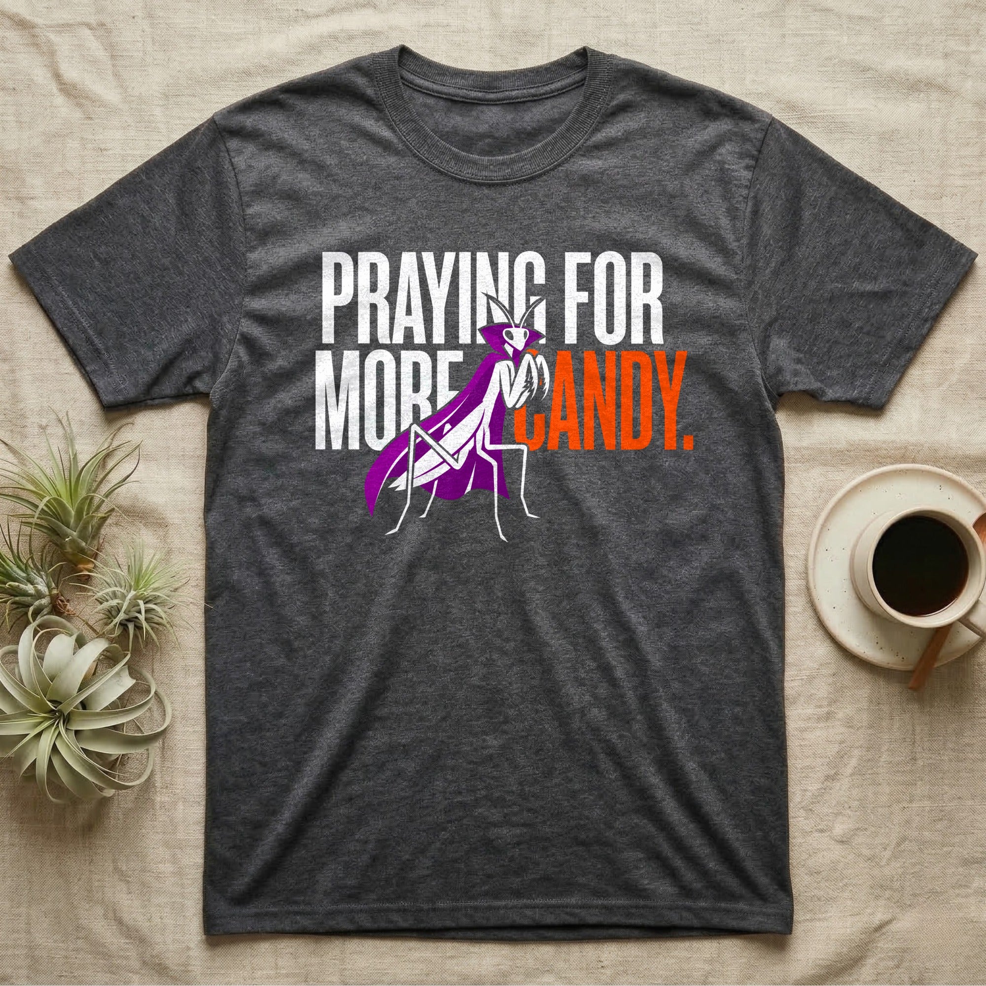 Ghost Mantis Praying For Candy T-Shirt in Dark Heather — Minimalist caped ghost mantis rearing up through bold text, "Praying for More Candy."
