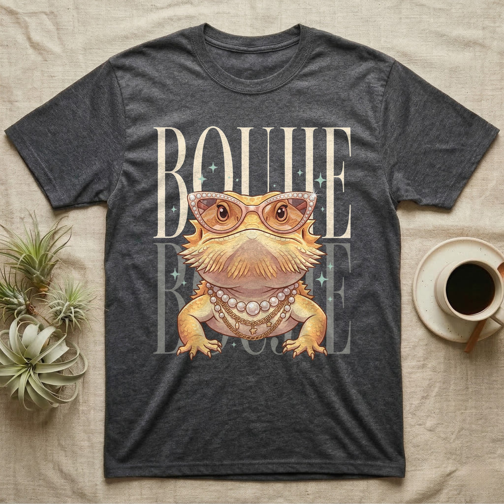 Dark t-shirt with a cartoon bearded dragon wearing sunglasses and jewelry.