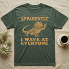 Bearded Dragon Engraving T-Shirt in Military Green — Antique green engraving of a bearded dragon raising one arm between the words APPARENTLY and I WAVE AT EVERYONE