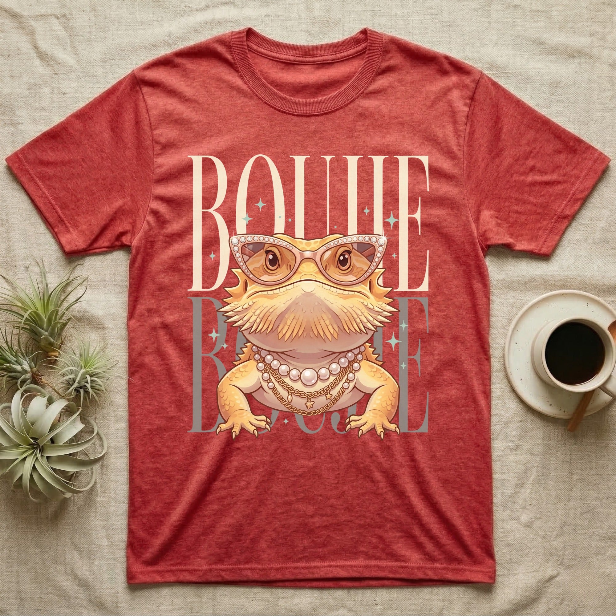 Bearded dragon wearing sunglasses and jewelry, with "BOUJE BEAST" text.