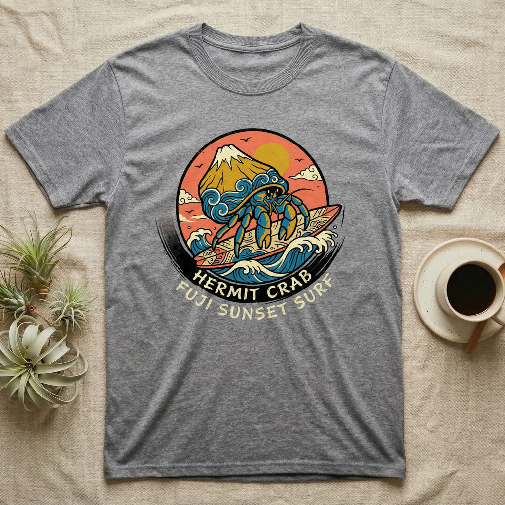 Hermit crab surfing towards a Fuji sunset on a t-shirt.