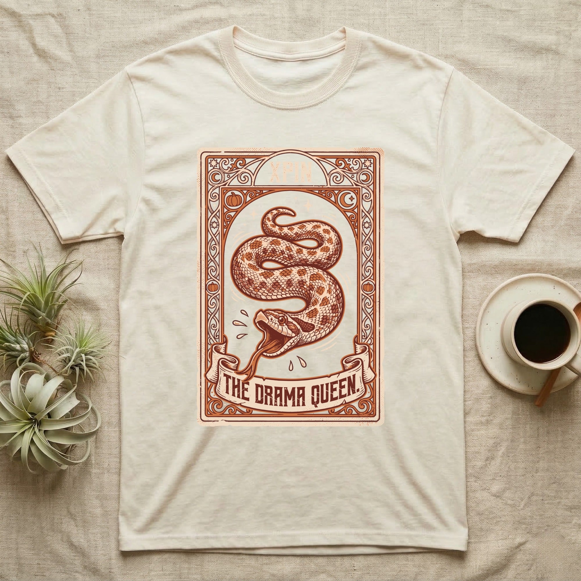 Hognose Snake Drama Queen T-Shirt in Natural — Ornate tarot card of a western hognose snake playing dead, banner reading "The Drama Queen."