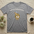 Hermann's Tortoise Hibernation T-Shirt in Sport Grey — Minimal doodle of a Hermann's tortoise in a striped nightcap holding a pillow under the words off to hibernate