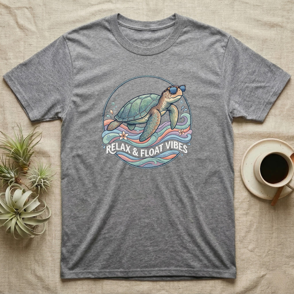Grey t-shirt with a cartoon sea turtle wearing sunglasses, relaxing.