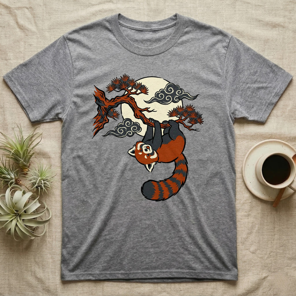 Gray t-shirt featuring a red panda hanging from a tree branch under a moon and clouds.