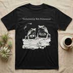 Technically Not Poisonous Dart Frog T-Shirt in Black — Three blue poison dart frogs on a bark ledge in distressed screen-print style under the line Technically Not Poisonous.