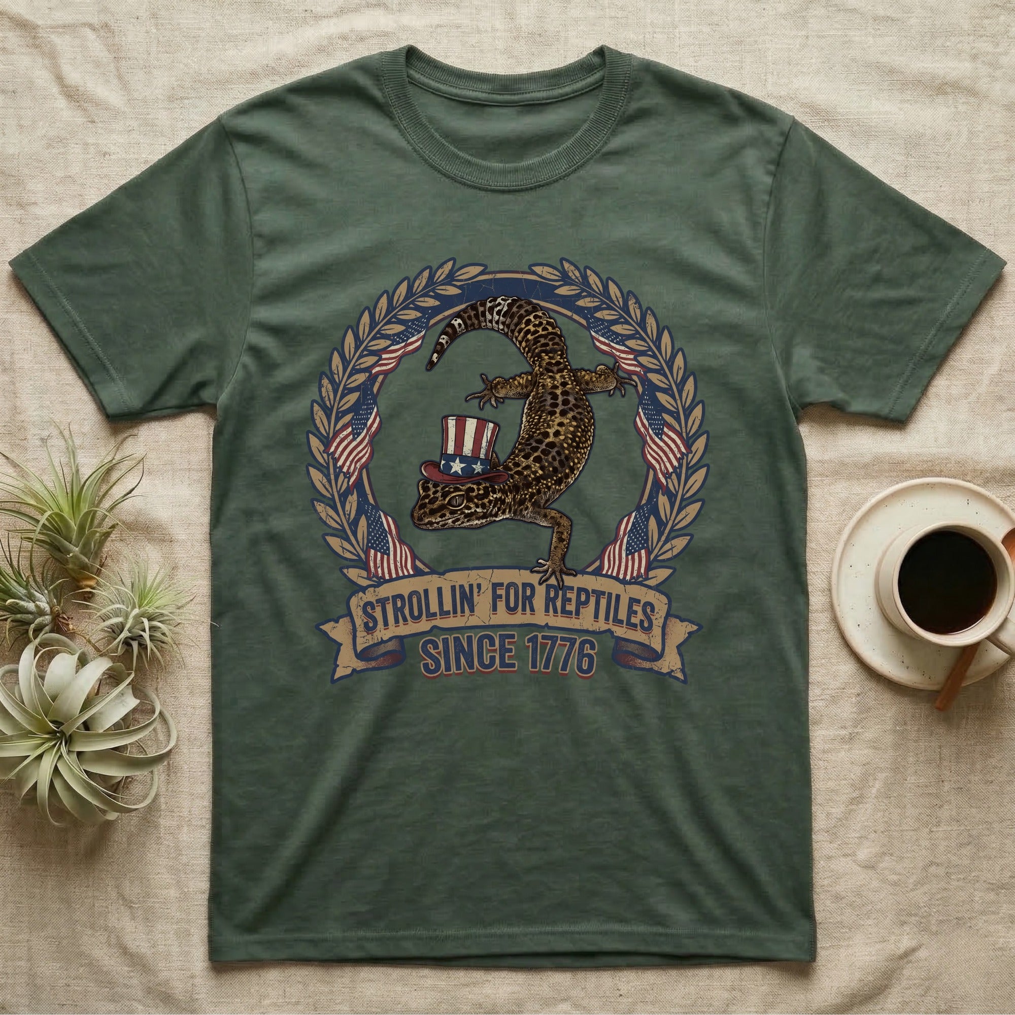 Leopard Gecko 1776 T-Shirt in Military Green — Vintage badge of a leopard gecko in an Uncle Sam hat with laurel wreath and flags, banner reading Strollin' For Reptiles Since 1776.