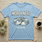 Pied Ball Python Morph T-Shirt in Light Blue — Grunge type "Morph Nerd" with a small pied-morph ball python coiled mid-design and "Pied Edition" caption beneath.