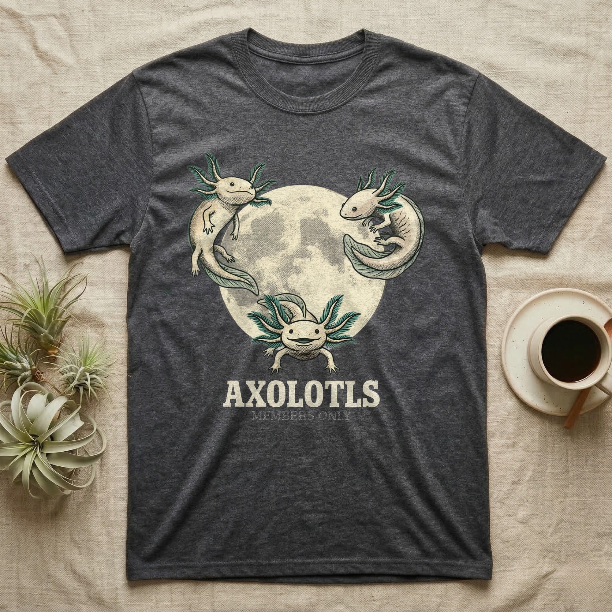 Three Axolotl Moon Tee in Dark Heather — Retro-illustration of three smiling axolotls with feathery gill plumes arranged around a stratified halftone full moon.