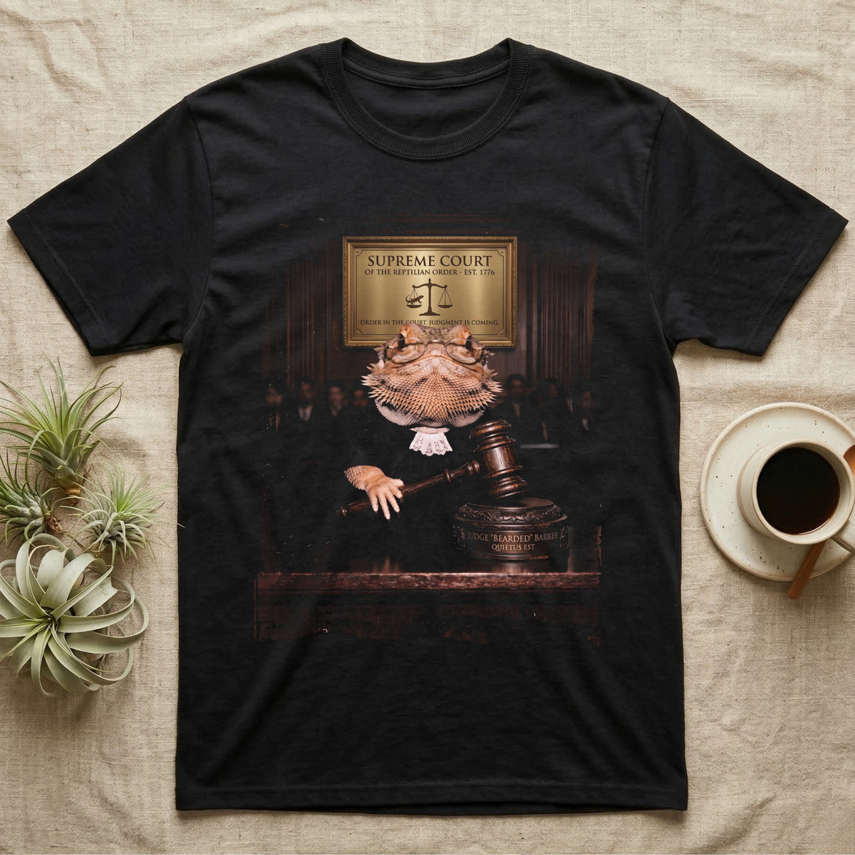 Bearded Dragon Judge T-Shirt in Black — Bearded dragon in a judge's robe and spectacles resting a hand on a gavel under a Supreme Court of the Reptilian Order plaque.