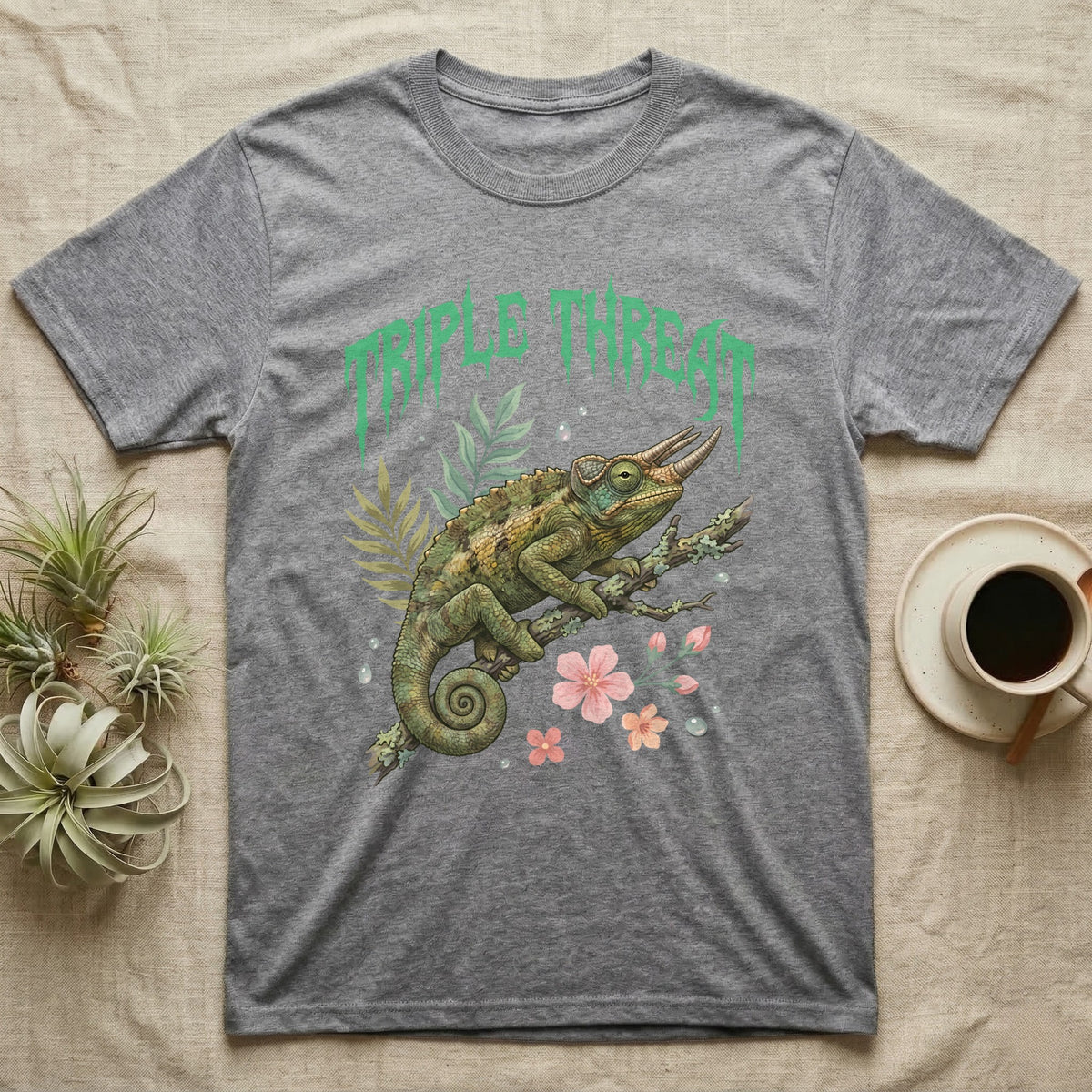 Jackson's Chameleon Feral T-Shirt in Sport Grey — Three-horned Jackson's chameleon on a branch below a dripping jade-green metal "Triple Threat" wordmark