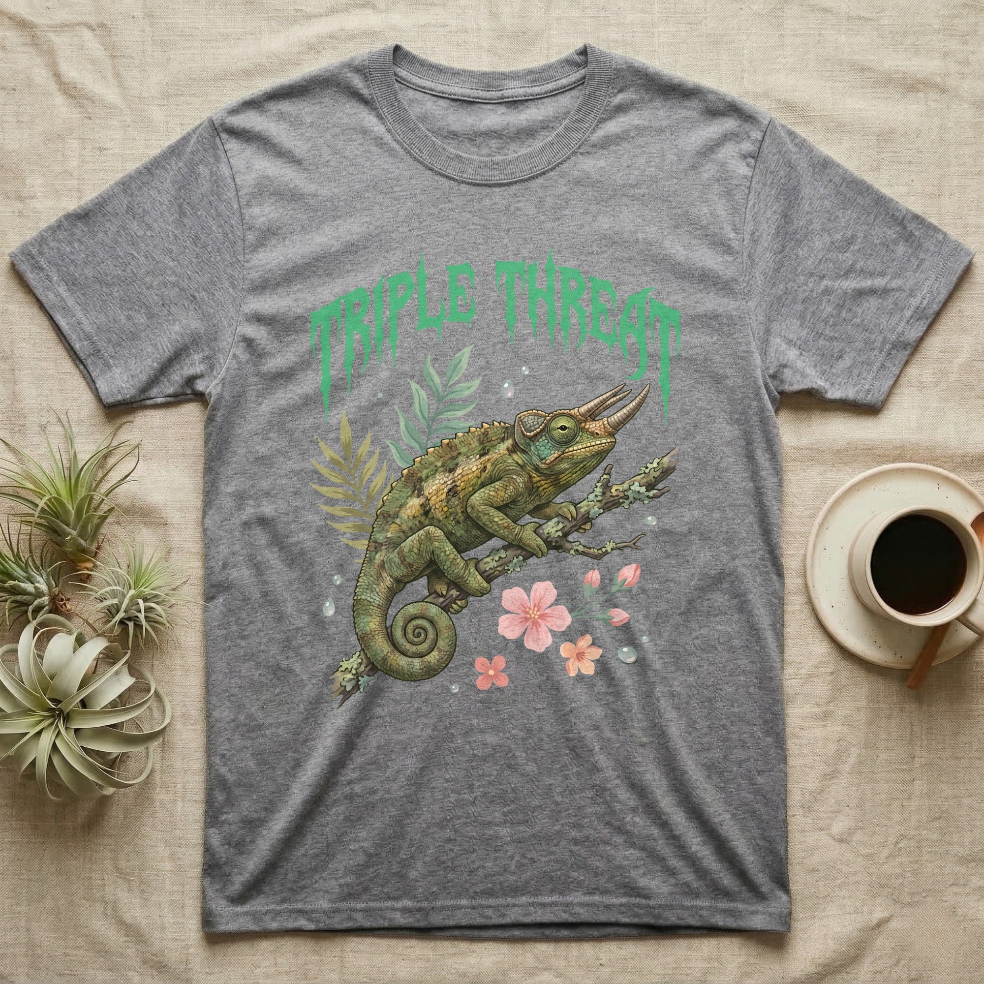 Jackson's Chameleon Feral T-Shirt in Sport Grey — Three-horned Jackson's chameleon on a branch below a dripping jade-green metal "Triple Threat" wordmark