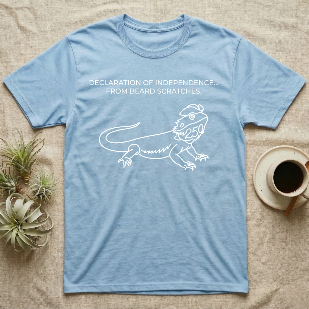 Bearded Dragon Line Art T-Shirt in Light Blue — White single-line bearded dragon in a tricorn hat under text Declaration of Independence From Beard Scratches.