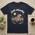 Savannah Monitor Softie T-Shirt in Navy — Plump savannah monitor lizard with flicking tongue under pastel bubble text "just chunky" and hearts.
