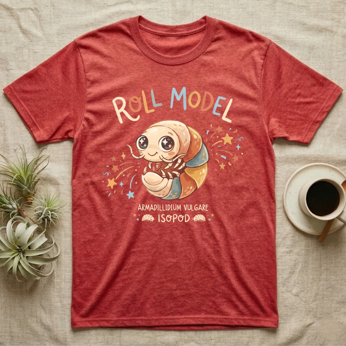 Roly Poly Isopod Roll Model T-Shirt in Heather Red — Storybook roly poly curled into a roll with starry eyes and confetti under hand-lettered "Roll Model".