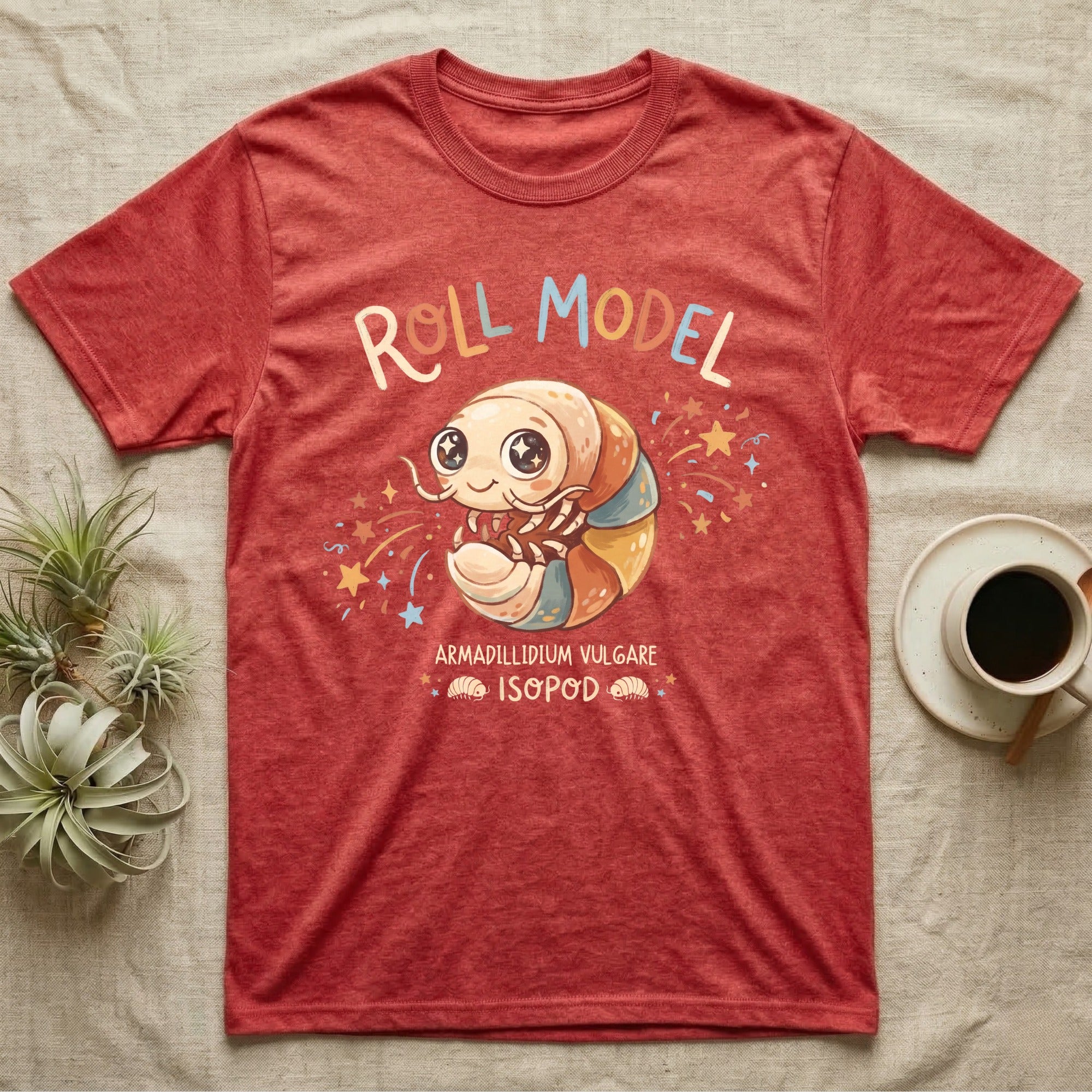 Roly Poly Isopod Roll Model T-Shirt in Heather Red — Storybook roly poly curled into a roll with starry eyes and confetti under hand-lettered "Roll Model".