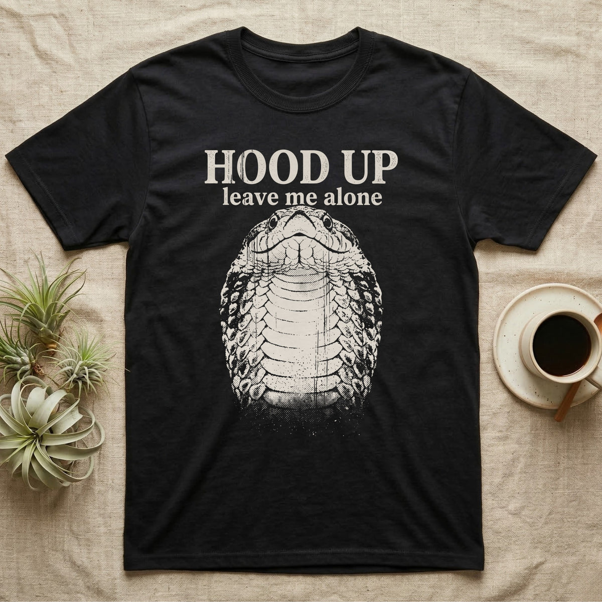 Hognose Hood Up T-Shirt in Black — Gritty white print of a western hognose reared up front-on with its neck flattened, under the words HOOD UP, leave me alone, on black