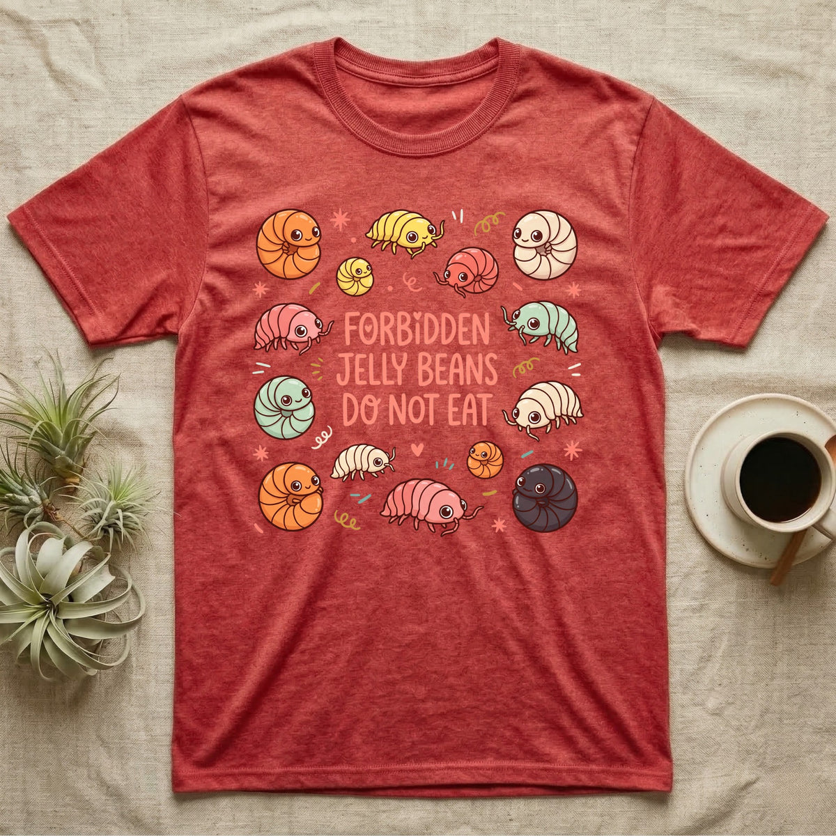 Red t-shirt with colorful cartoon pill bugs and text "Forbidden Jelly Beans Do Not Eat."
