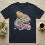 Three bearded dragons stacked on top of each other.