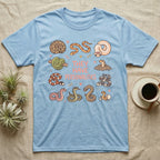 Snake Keeper Personalities T-Shirt in Light Blue — Outline illustration of five snakes in different postures scattered around hand-lettered script on grey.