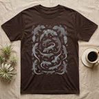 Gecko Specimen Plate T-Shirt in Dark Chocolate — Engraved white-line specimen plate of fifteen Madagascan geckos and fern sprigs on charcoal grey