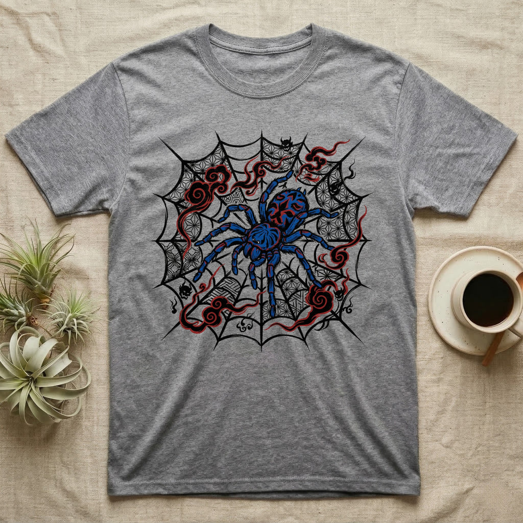 Grey t-shirt with a blue and red spider on a black web design.