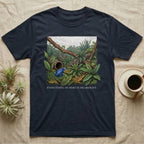 Dart Frog Bioactive Vivarium T-Shirt in Navy — Illustrated panel of a cobalt dart frog in a layered planted vivarium, leaves crossing the inked border.